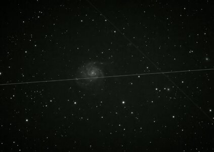 M101StackedSatellitesAffinityStretchedCropped.jpg