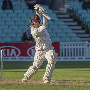 Essex batsman Tom Westley driving through the covers