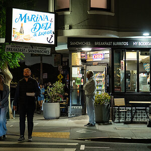 Man carrying takeout.jpg