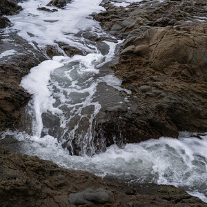 Pebble Beach-Flowing Water over the rocks
