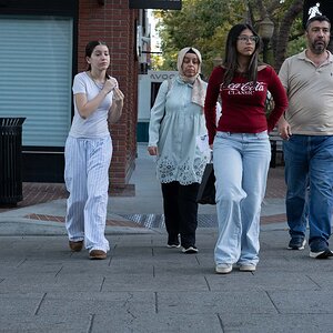 Family walking down University Ave in Palo Alto, California