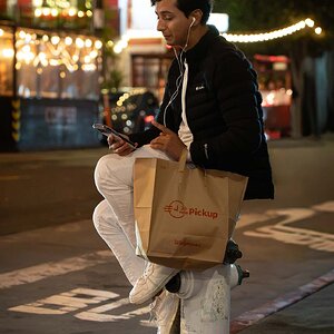 Man sitting on fire plug (1 of 1).jpg