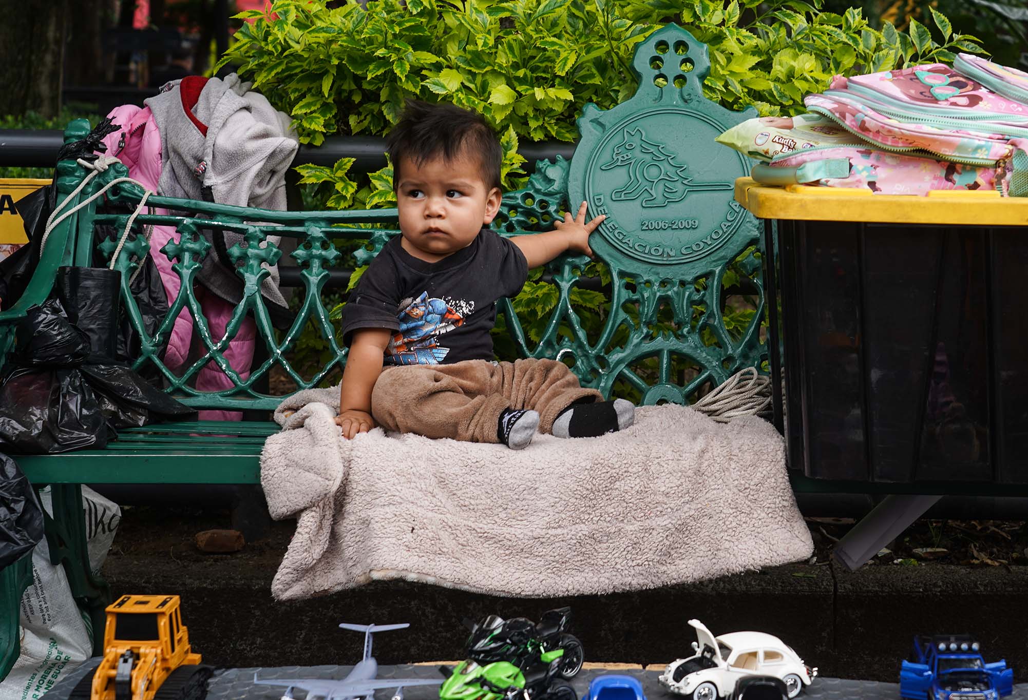 Baby on a park bench in Mexico City