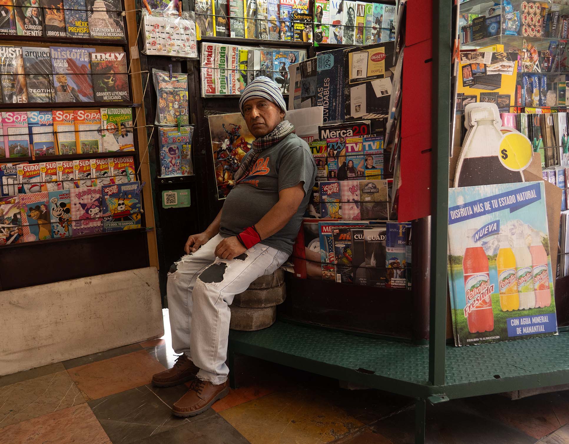 Man at Magazine Stand in Publa City