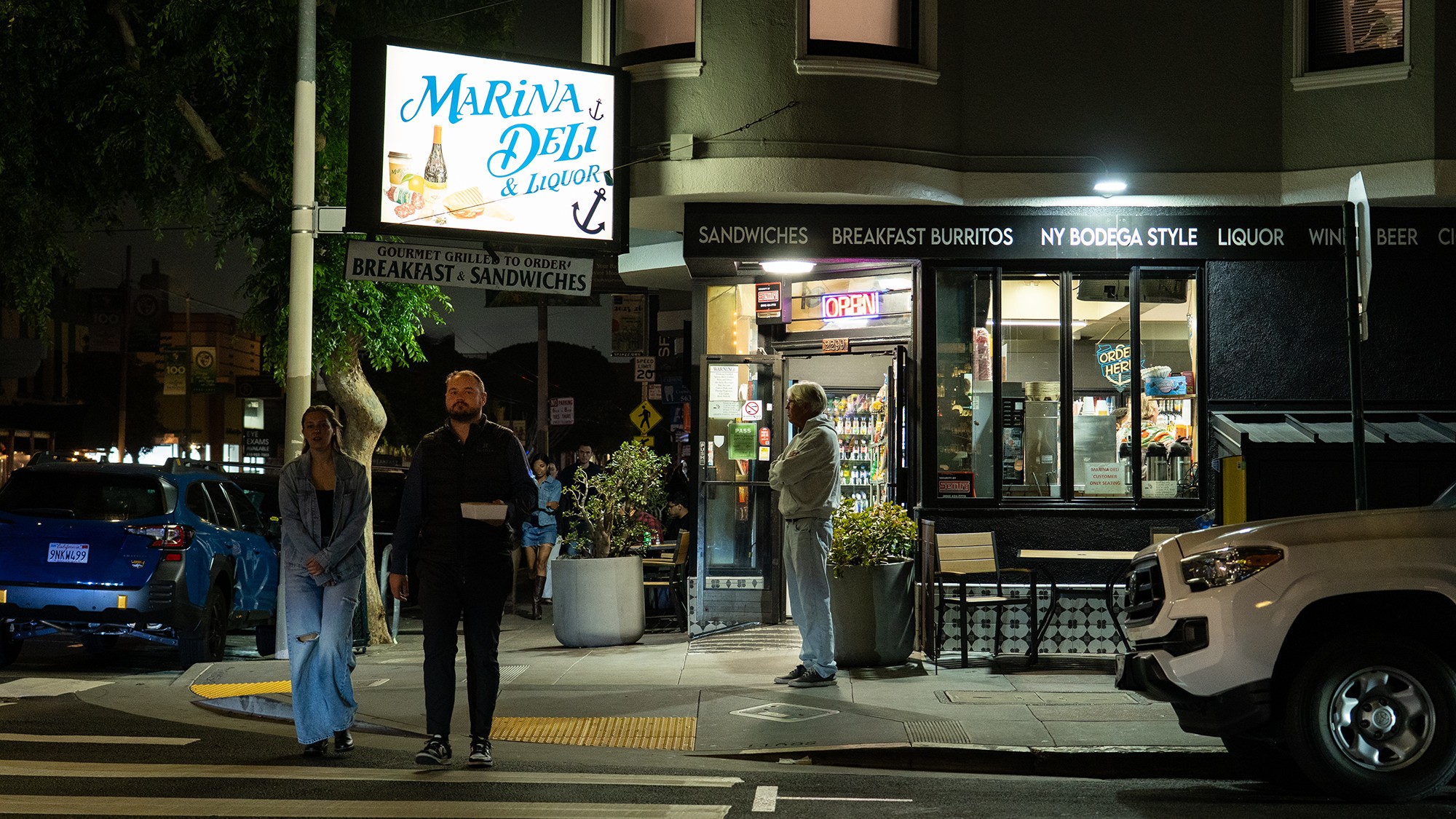 Man carrying takeout.jpg