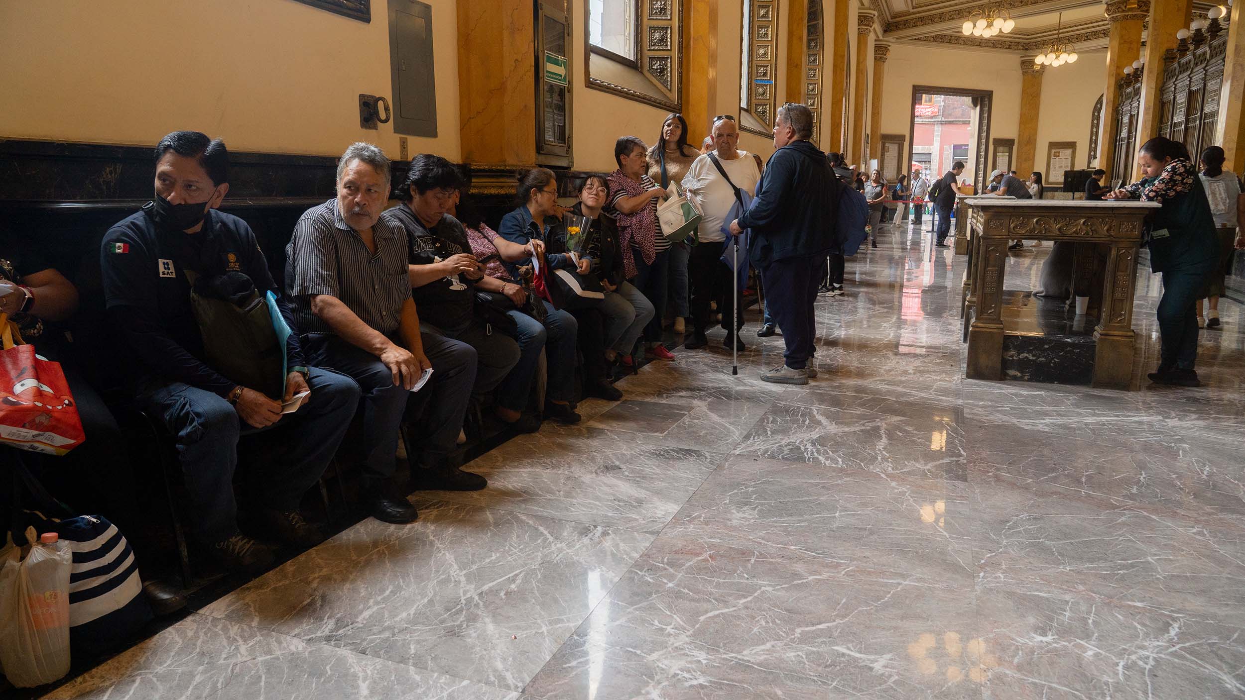 People waiting in the Post Office in Mexico City.jpg