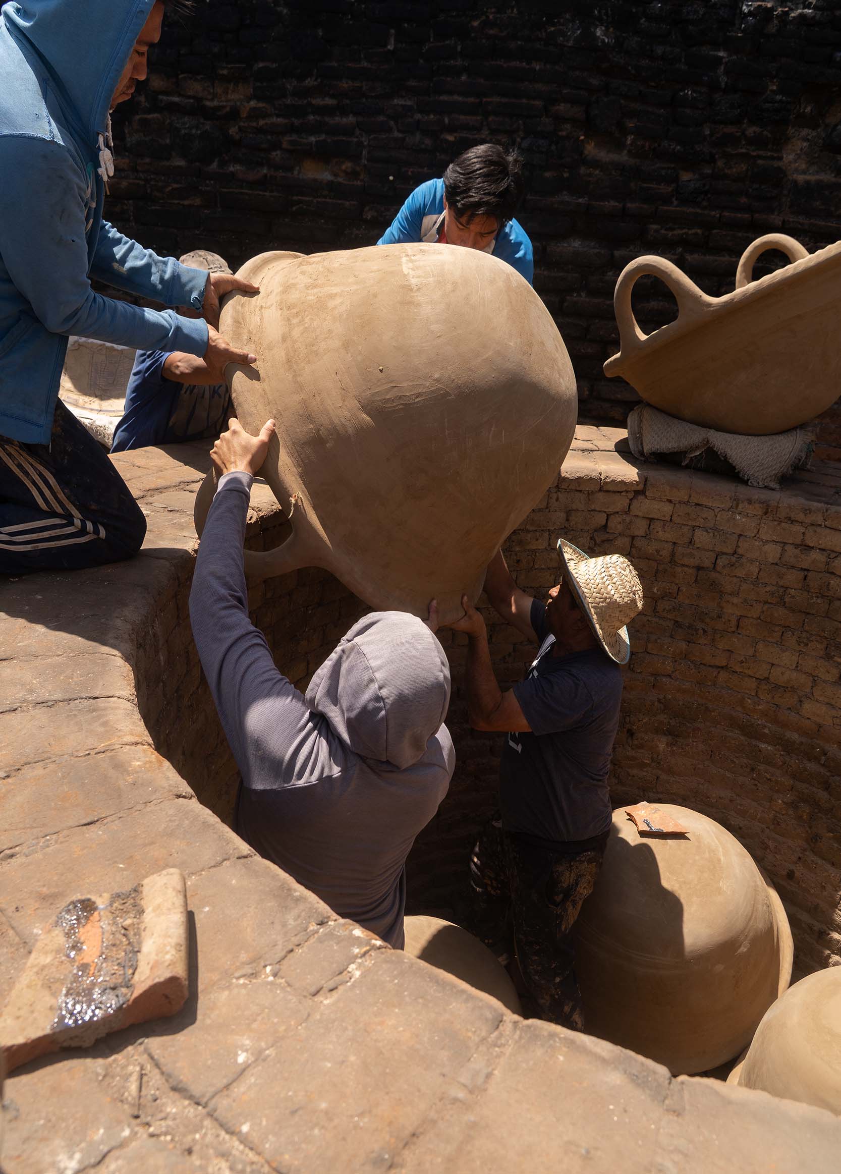 Pottery factory -Loading the large kiln
