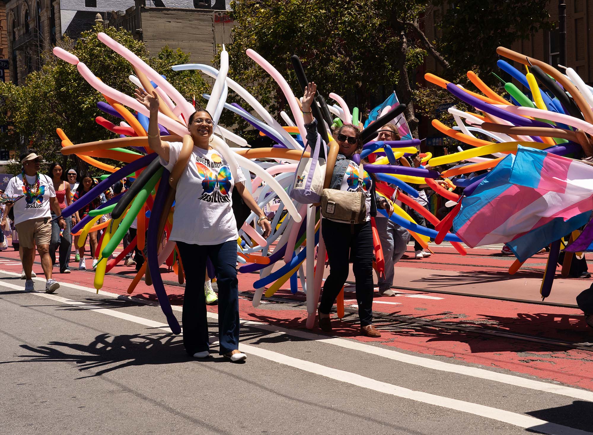 San Francisco Pride Parade 2026 - Women with skinny balloons