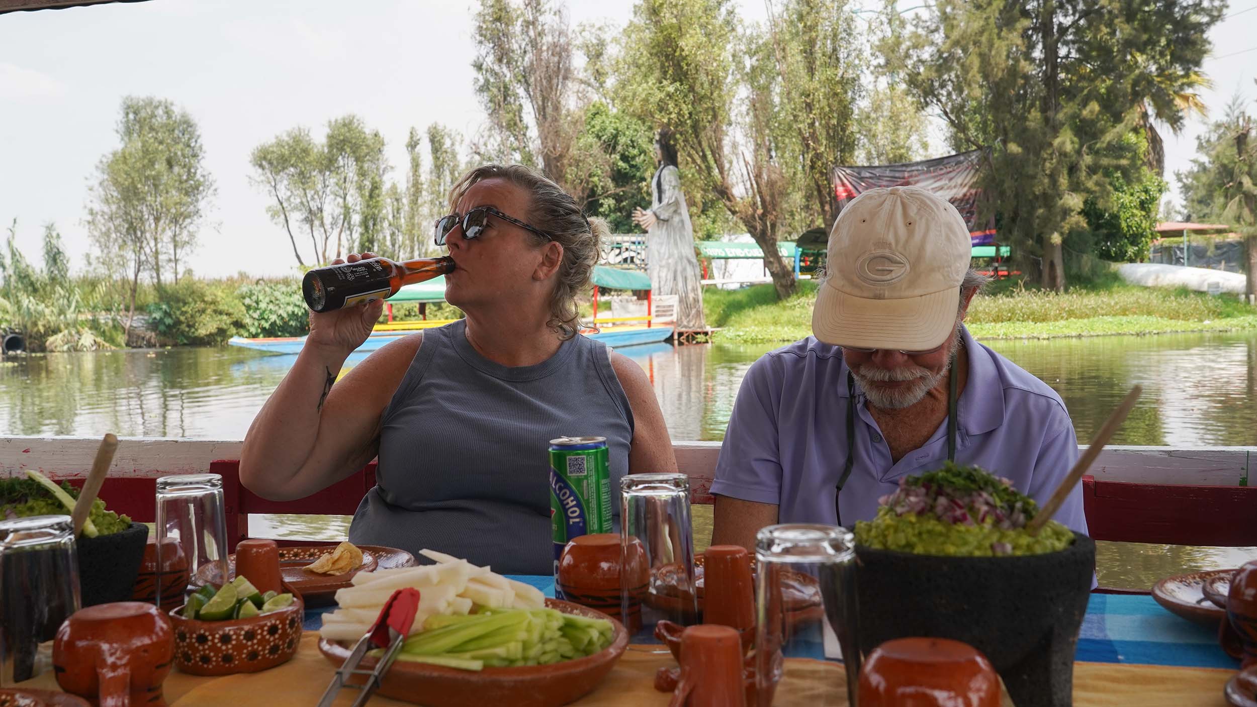 Tourists enjoy a special lunch at Xochimilco.