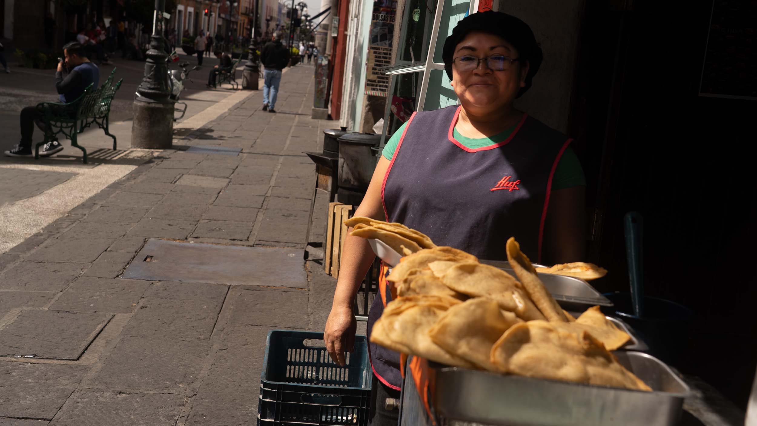 Woman selling Street tacos in Puebla City